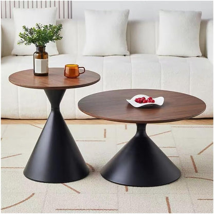 Two wooden side tables with black metal legs in a living room setting.