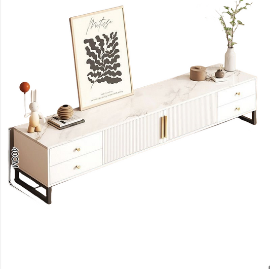 White entertainment console with decorative items on a white background