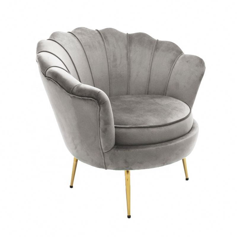 Gray velvet armchair with gold legs on a white background